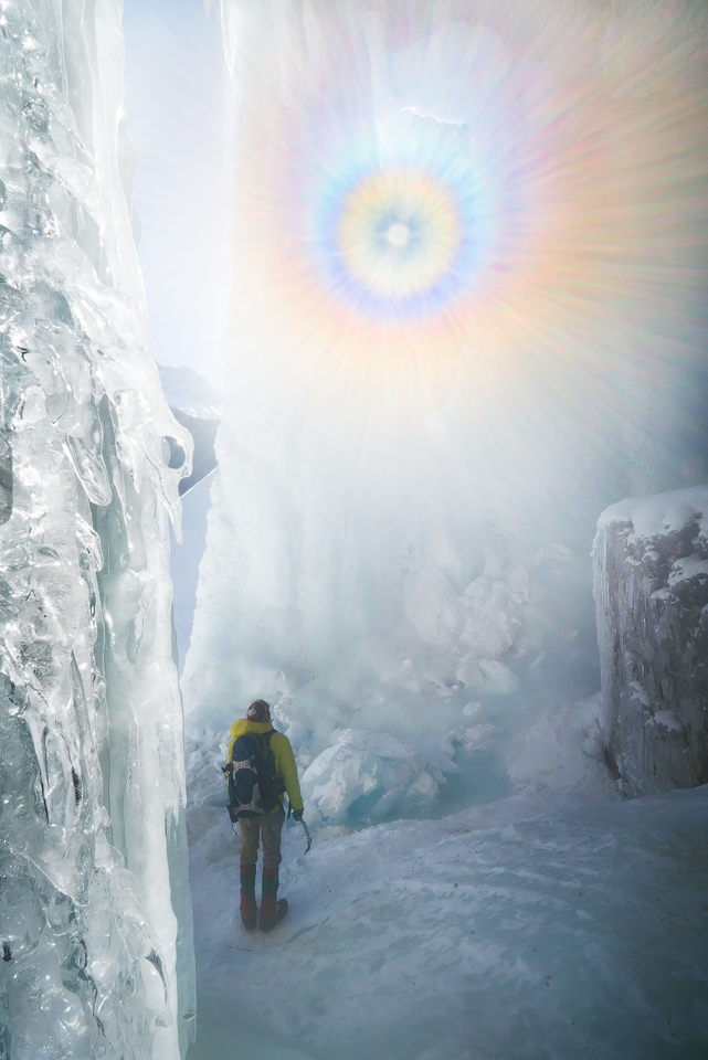 A solar corona in bright sunlight behind Panther Falls in Banff National Park