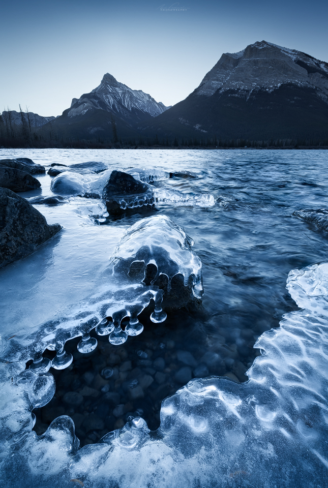 Ice plugs forming along the edge of Gap Lake, Exshaw, Alberta, Canada